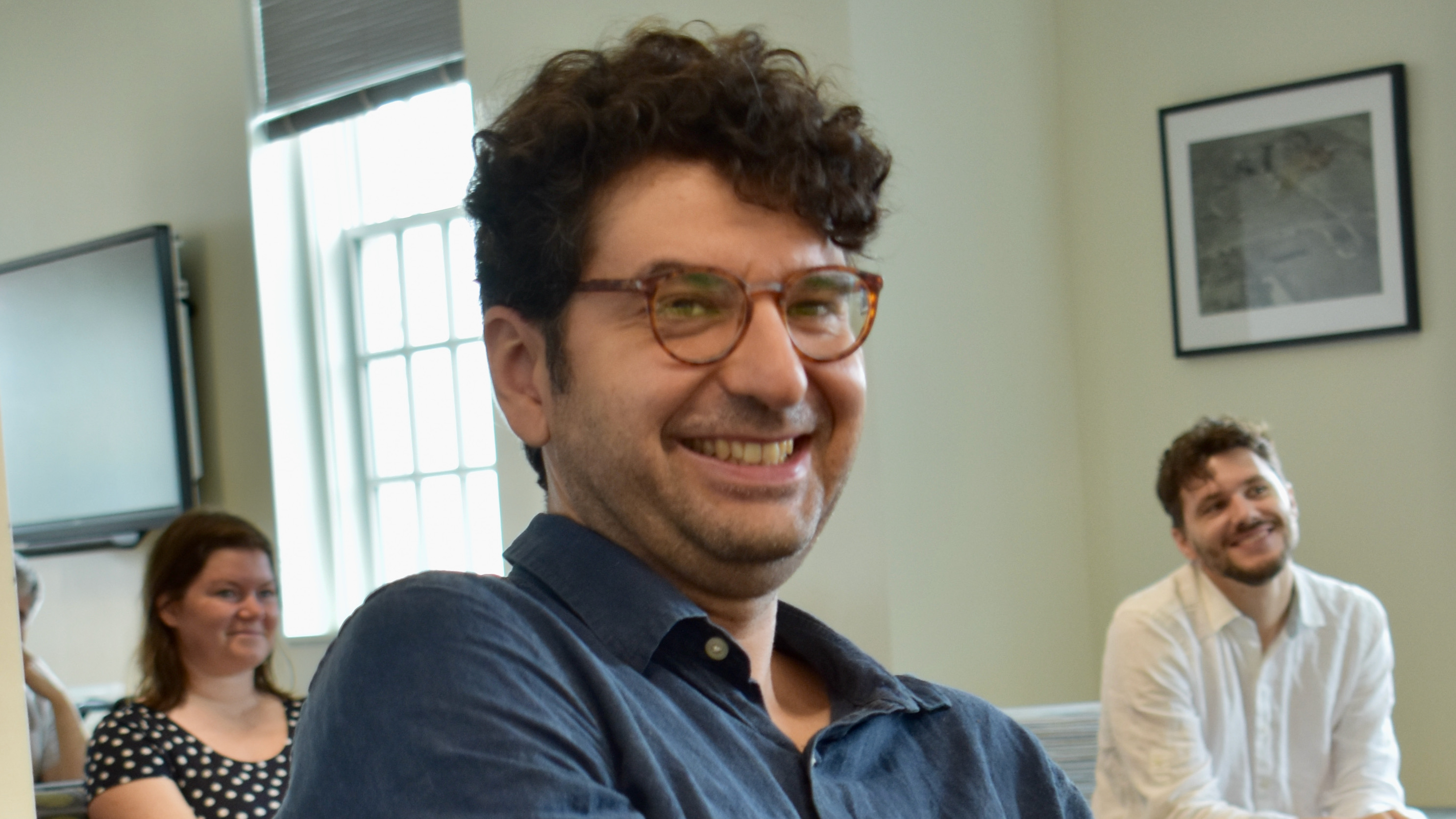Philosophy professor Paolo Santorio giggling.