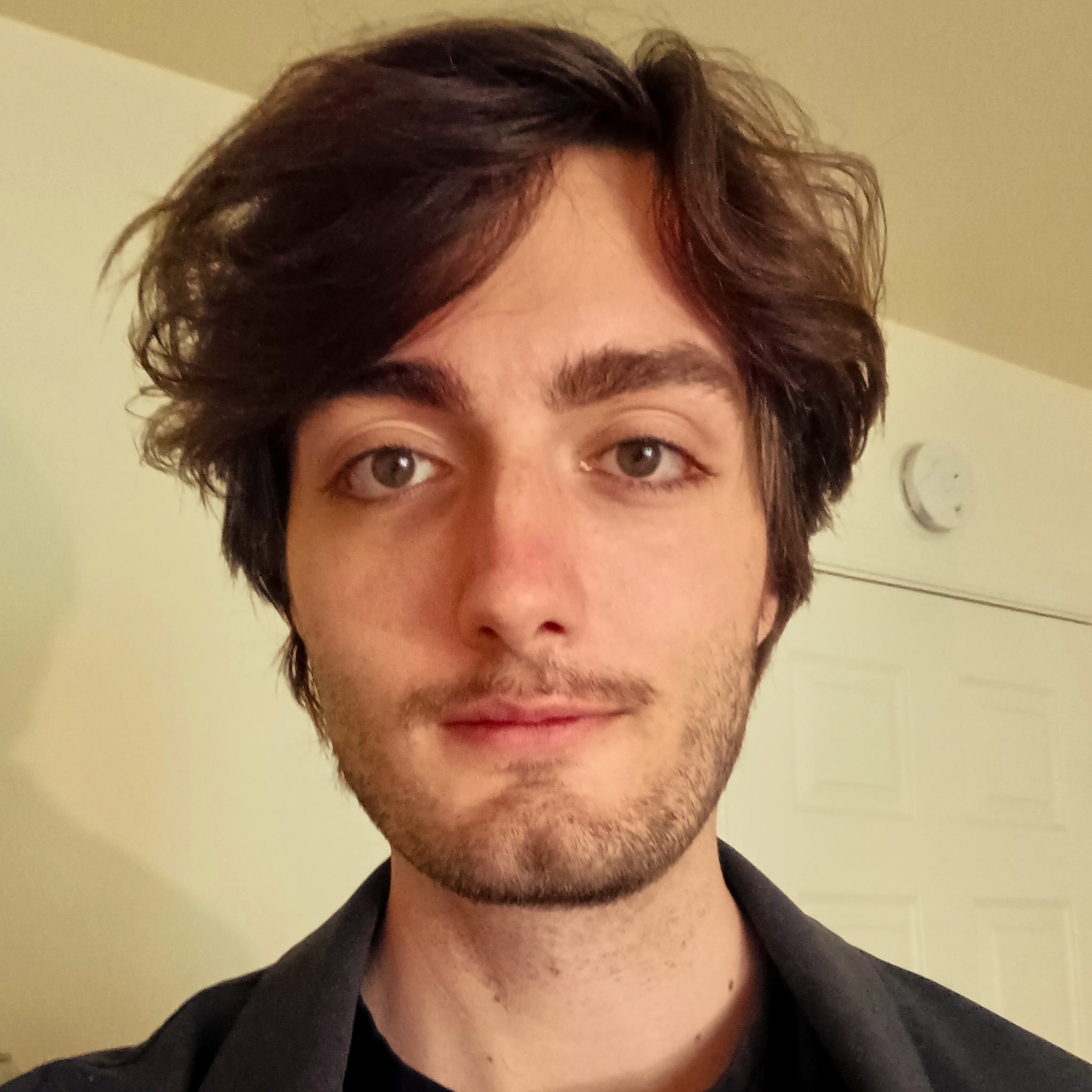 Close portrait of a young man's face.