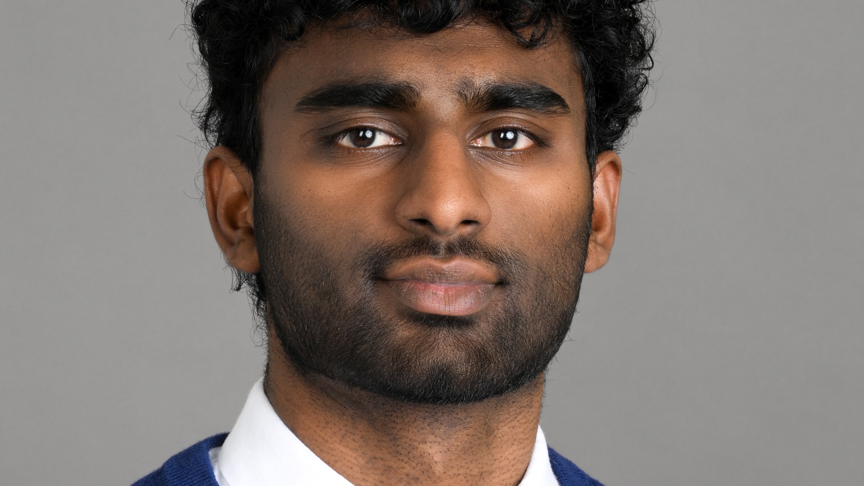 Close head-shot of a young man.